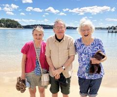 A group of 3 seniors enjoying a day at the beach