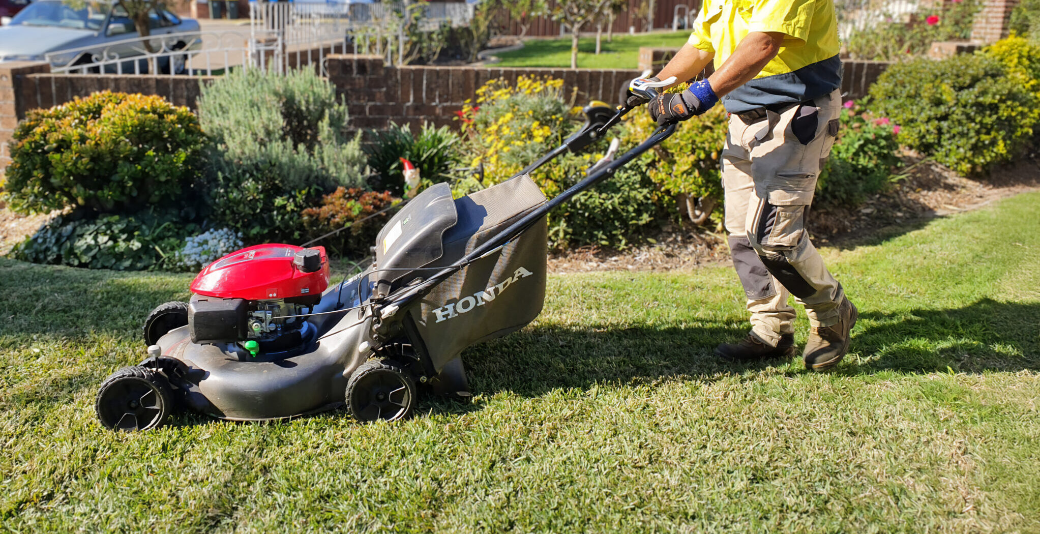 A man mowing the lawn