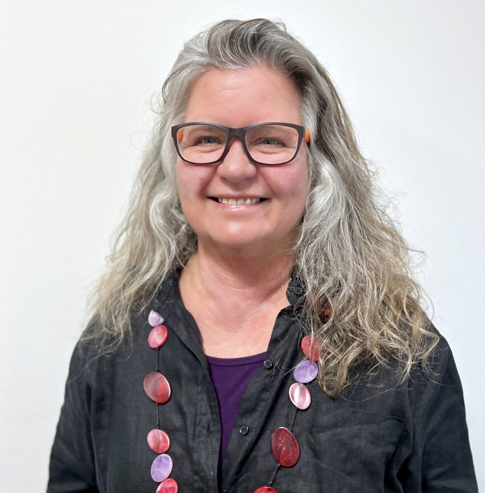 Smiling portrait of Kate, Community Sector and Capacity Manager